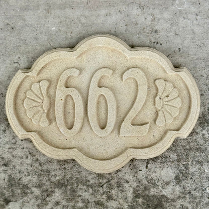Numero civico in pietra leccese lavorato a mano.